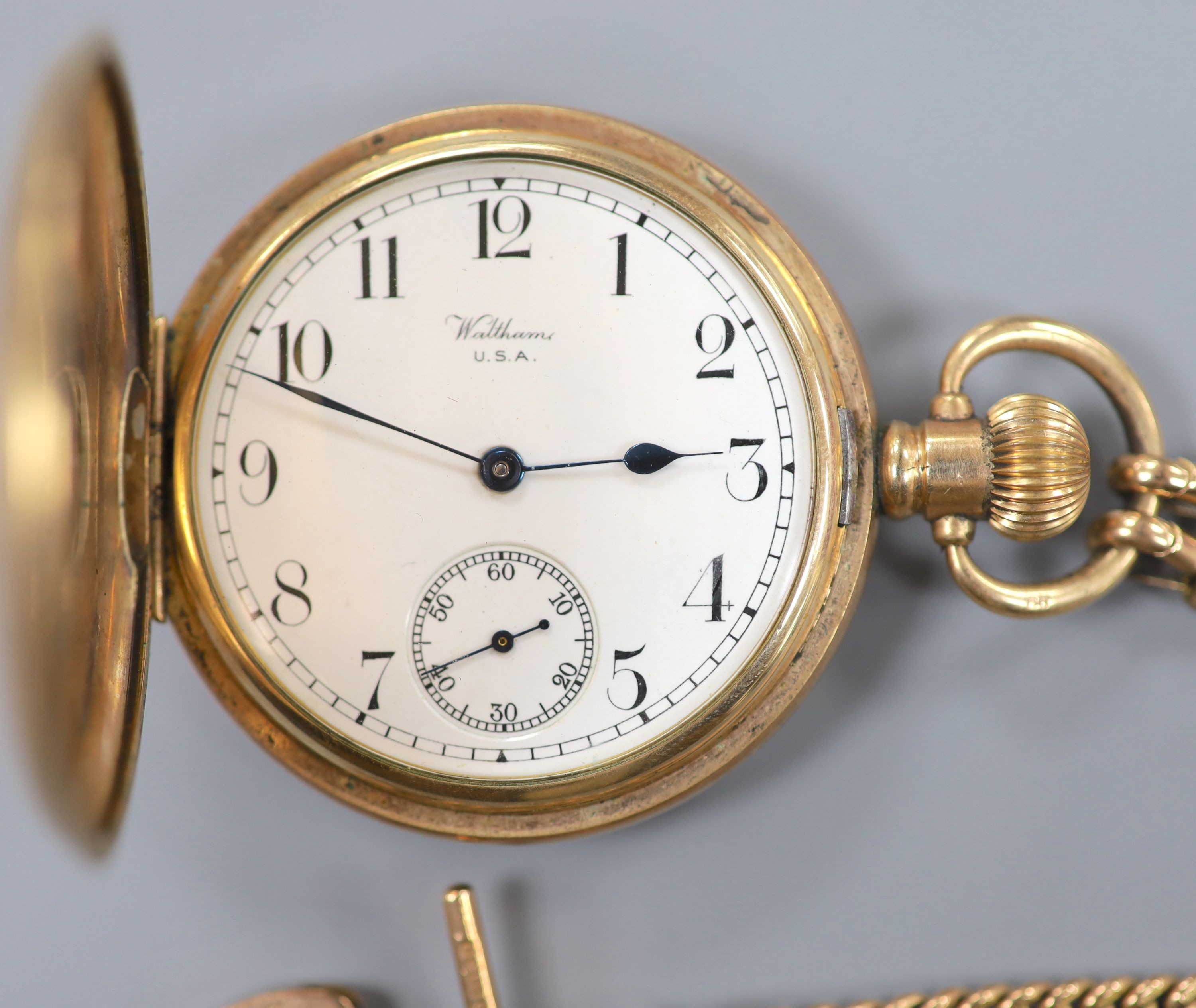A 9ct gold albert, 44cm, 31.7 grams, together with a gold plated Waltham hunter pocket watch.